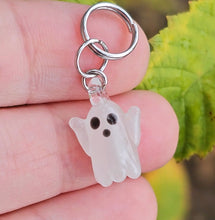 Load image into Gallery viewer, UV Ghost charm glows pink under black light
