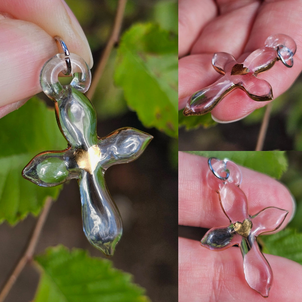 Cross pendant with gold heart